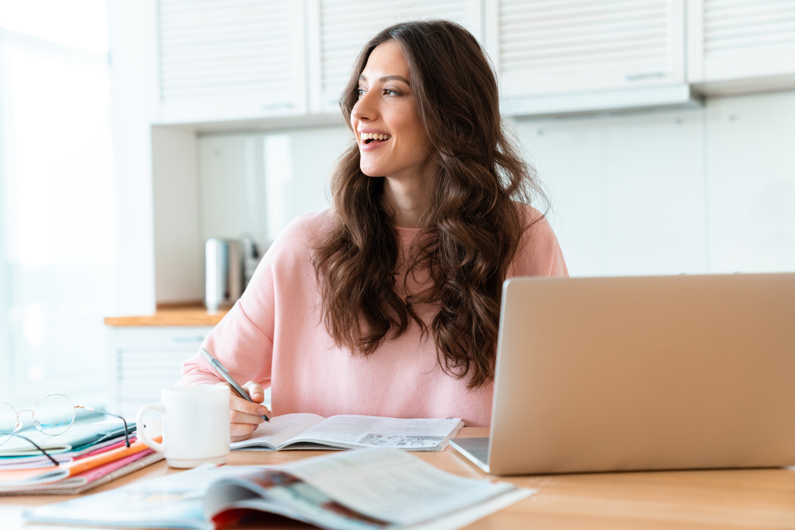 Smiling Female Student Studying at Home
